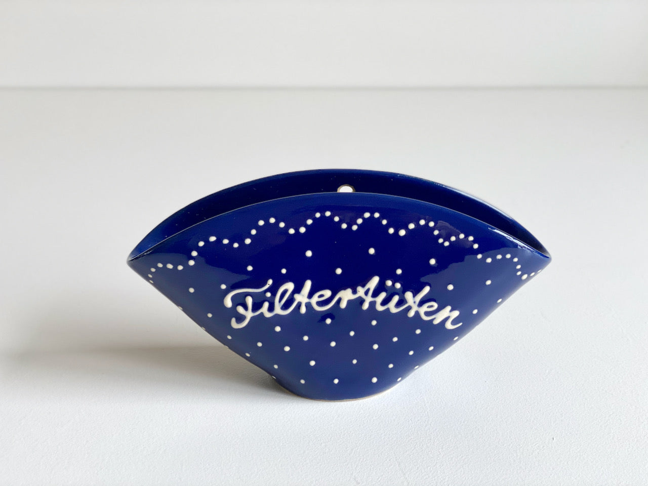 Filtertütenhalter